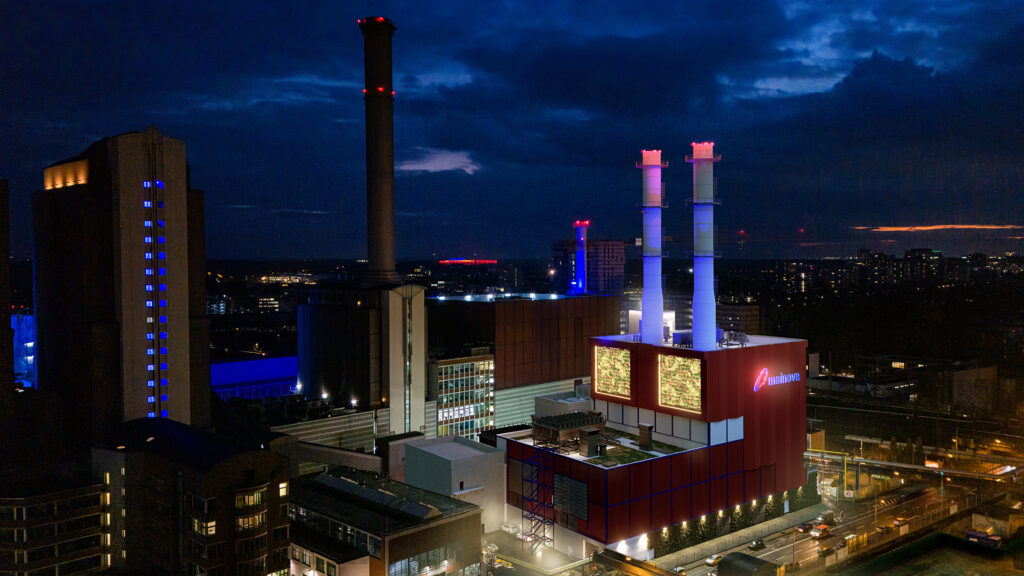 Night-time photomontage of the planned hydrogen-capable gas turbine plant illuminated at HKW West